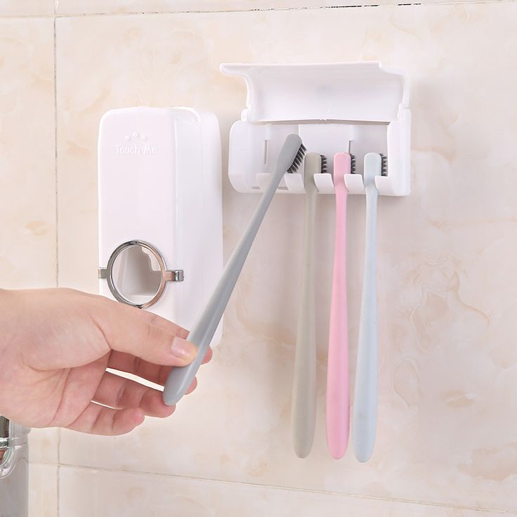 Distributeur de dentifrice + support mural pour brosses à dents.