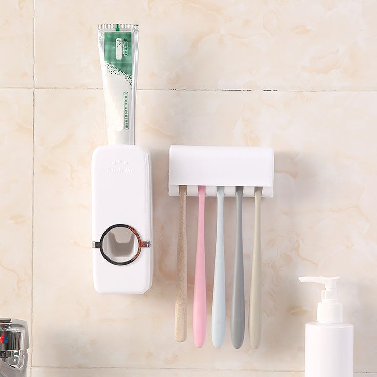 Distributeur de dentifrice + support mural pour brosses à dents.